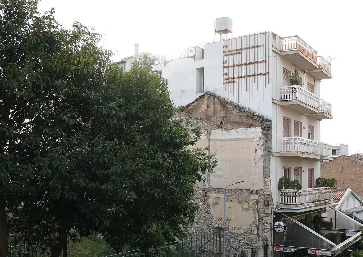 TELL ME (2021) documents the post-industrial character of the city of Patras through the oral stories of selected working-class members. The artistic groundwork evolves in a publication, a podcast, and a proposal for three public sculptures.